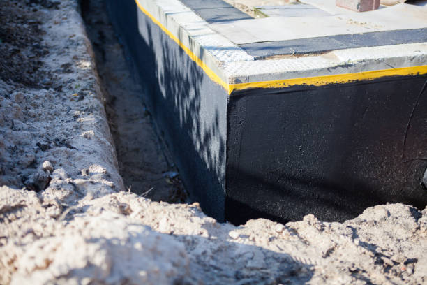 Professional Waterproofing technician working in Pickett, WI